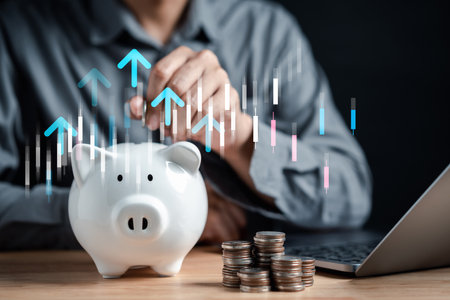 Businessman saving money coin in piggy bank for growth to success goal. Funds and stock Invest profits. assets, wealth, lucrative. investment and retirement concept.の写真素材