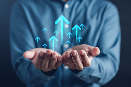Growth arrows increase planning business target to successful. Businessman holding arrows goal to leadership objective goal. Corporate strategy for finance, operations, sales.の写真素材