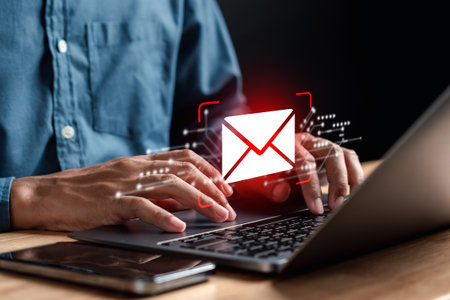 Alert Email inbox and spam virus with warning caution for notification on internet letter security protect, junk and trash mail and compromised information.の写真素材