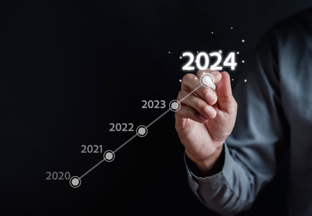 Steps Growth up of Happy new year resolution planning and challenge strategy business with arrow up in New year 2024 with chart graph and countdown merry christmas and happy new year concept.の写真素材