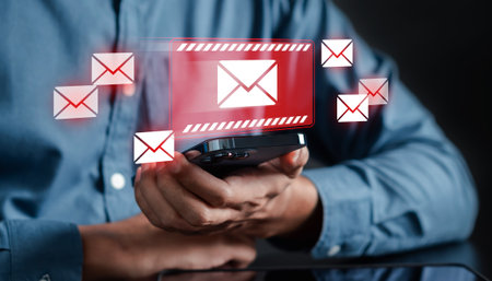 Alert Email inbox and spam virus with warning caution for notification on internet letter security protect, junk and trash mail and compromised information.の写真素材