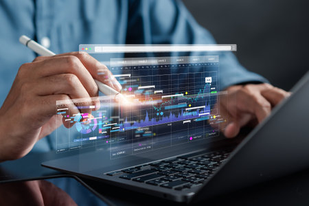 Analyst working with computer in Business Analytics and Data Management System to make report with KPI and metrics connected to database. Corporate strategy for finance, operations, sales, marketing.の写真素材