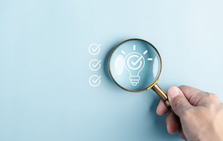 Quick tips for smart creative. light bulb and idea checking icon inside magnifier glass, working Creativity, Creative for new innovation with energy and power, growth and success development.の写真素材