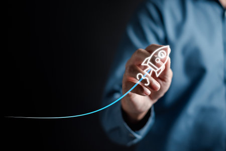 Businessman touch rocket launch investment growth, planning and starting corporate business start up aiming objective value development leadership and customer target group.の写真素材
