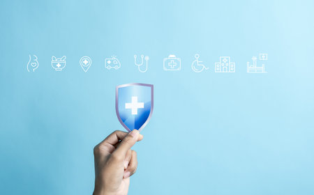 Health insurance and medical welfare concept. people hands holding plus symbol and healthcare medical icon, health and access healthcare.の写真素材
