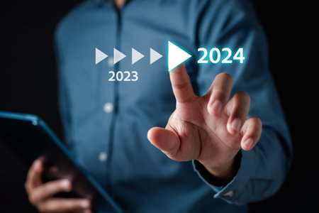 Pointing Happy New year 2024 with chart graph and countdown merry christmas and happy new year, Planning and challenge strategy business in new year 2024 Concept.の写真素材
