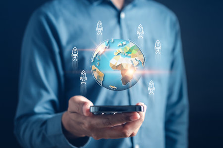 Businessman holding virtual world with Business global and rocket launch internet connection technology and digital marketing, Financial and banking.の写真素材