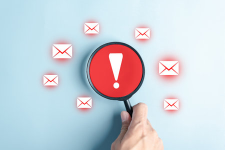 Alert Email inbox and spam virus with warning caution for notification on internet letter security protect, junk and trash mail and compromised information.の写真素材
