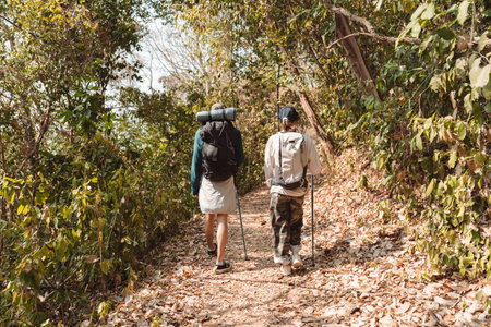 Hiking Couple Activity climbing on mountain backpack travel and adventure, Travel lifestyle in nature.の写真素材