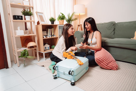 Woman Baggage Trip Holiday Friends Packing Suitcase Home Female Vacation, Two Young Friends Joyfully...