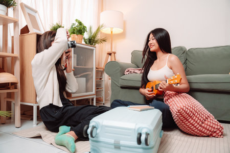 Woman Baggage Trip Holiday Friends Packing Suitcase Home Female Vacation, Two Young Friends Joyfully Preparing Their Luggage for a Fun and Relaxing Summer Journey Together at Homeの写真素材