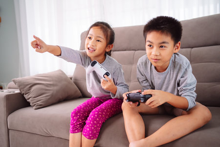 Child Asian Playing Video Game Friends Boy Girl Entertainment Video Game, Fun Moment of Friends...