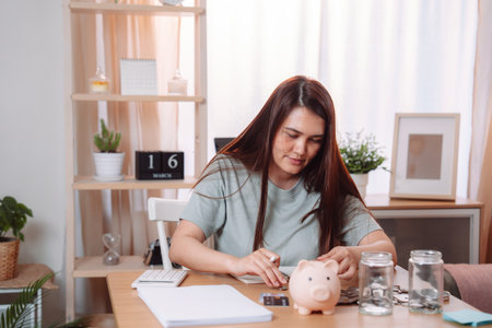 Woman Financial Working Planning Saving Accounting Businesswoman Report Female Office, Professional Analyzing Reports and Planning Financial Strategies for Business Success at Her Office Deskの写真素材
