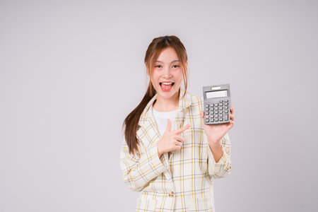 Finance Shock Woman Calculate Surprised Debt Economy Education Expression, A Young Woman Reacting in Shock While Calculating Expensesの写真素材