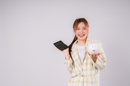 Finance Shock Woman Calculate Surprised Accountant Debt Economy Education Expression, A Young Woman Reacting in Shock While Calculating Expensesの写真素材