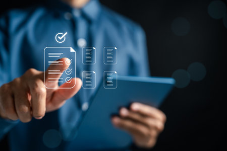 Checklist document with approval mark, document validation, quality control, and completed workflow on digital tablet. Perfect for business, audit, or certification visuals.の写真素材