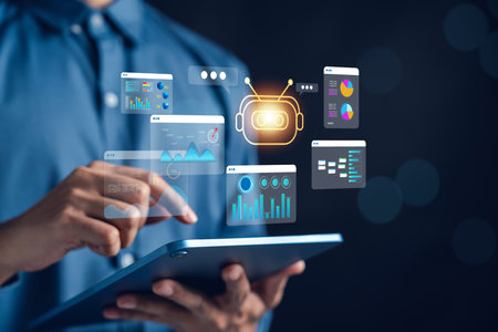 Businessman using AI technology and robotic automation on digital tablet with analytics dashboards. Concept of artificial intelligence, machine learning, and smart business solutions.の写真素材