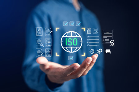 ISO certification and quality management with digital compliance documents and checklist, symbolizing standards, assurance, business process, audit, and performance control.の写真素材
