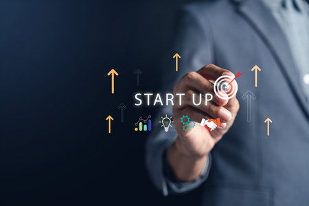 Startup business growth with businessman plan target and arrow with innovation, analytics, and...