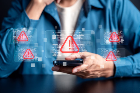 Cybersecurity warning concept with alert, data breach risk, malware attack, and online security threats in digital technology environment.の写真素材