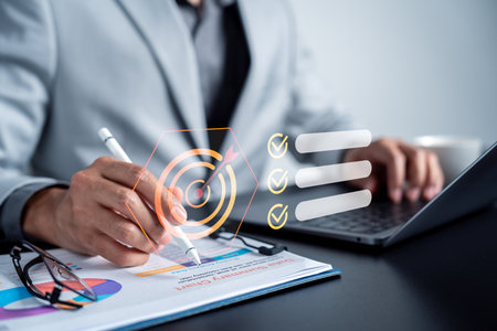 Business strategy planning. businessman analyzing data and setting goals with a checklist. marketing, and productivity.の写真素材