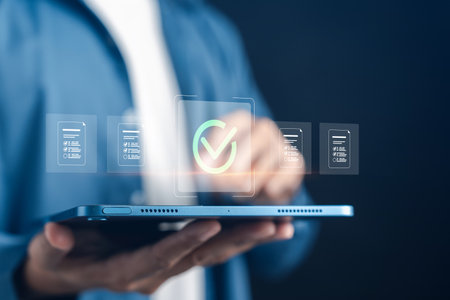 Digital document check and approval system with verification, compliance, validation, quality control, and secure workflow in business technology.の写真素材