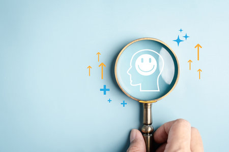Wellness and positivity concept with magnifying glass focusing on human head smile, mental health, emotional balance, happiness, growth, and positive lifestyle.の写真素材