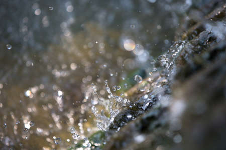 water splash with color backgroundの写真素材