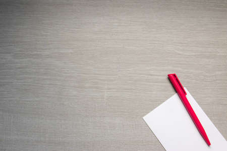 red pen on tableの写真素材