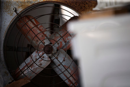 Old rusty fan of air conditioner. Selective focus. Shallow depth of fieldの写真素材