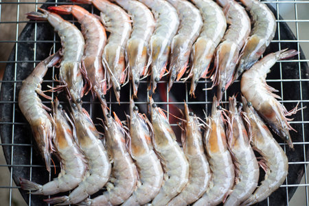Grilled prawns on the grill in the market, Thailand.の写真素材