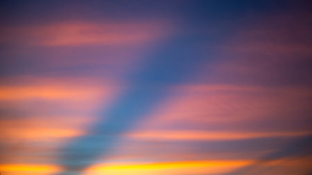 Colorful dramatic sky with cloud at sunset. Sky background. Cloudscape.の写真素材