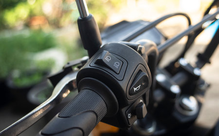 Detail of the steering wheel of a motorcycle. Selective focus.の写真素材