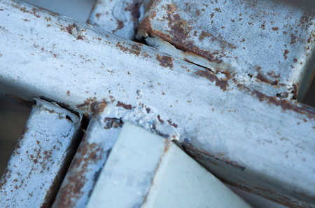 Rusty steel rod close-up. Industrial background. Selective focus.