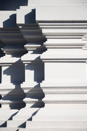 Thai style white wall background with shadow and copy space for design