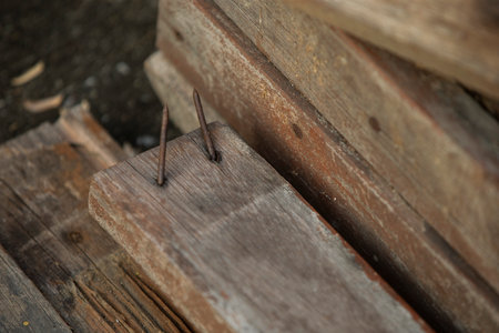 Old wooden chair with nails. Selective focus and shallow depth of field.の写真素材
