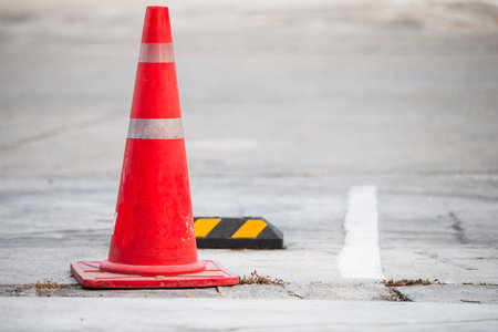 Traffic cone on the road with white line background, Safety conceptの写真素材