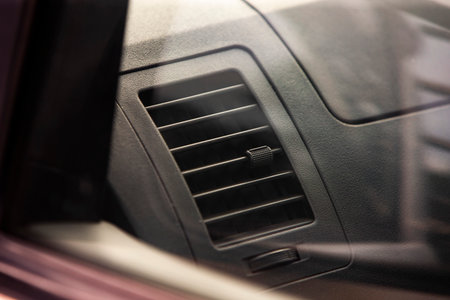 Modern car interior details, closeup of car air conditioning and ventilation