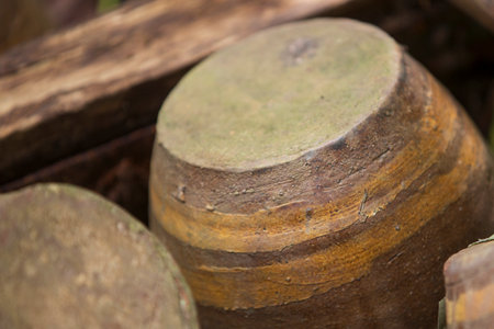 Close up of old Clay jar in a country house in Thailand