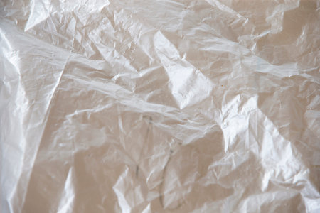White crumpled plastic background. Texture of crumpled plastic.の写真素材