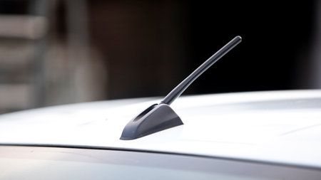 Closeup of a car windscreen wiper on a white carの写真素材