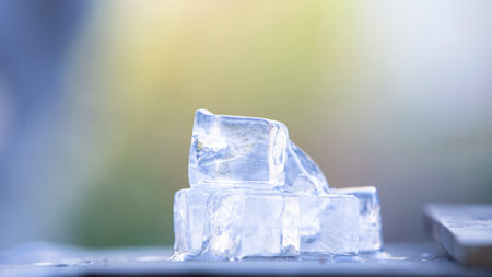 Ice cubes on wooden tableの写真素材