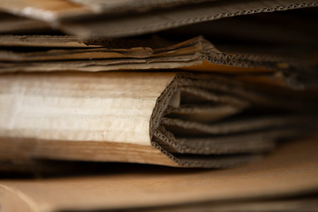 Stack of old newspapers close-up. Shallow depth of field.