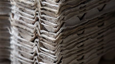 close up of a stack of cardboard boxes in a warehouse