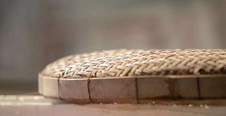 Detail of a wicker basket on a table in a shop