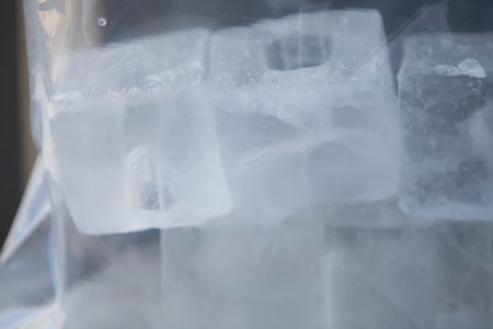 Ice cubes in a plastic bag. Close-up. Selective focus.の写真素材