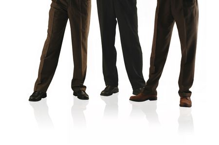waist down shot of 3 business men in slacks.