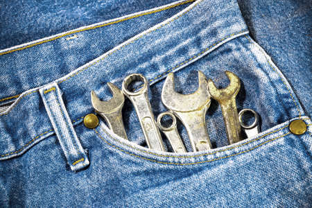 Tools in blue jeans pocketの写真素材