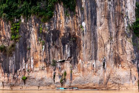 Big and high  Rock Cliffs mountain of  Mekong River in Pak Ou luang prabang Laos peak, natureの写真素材