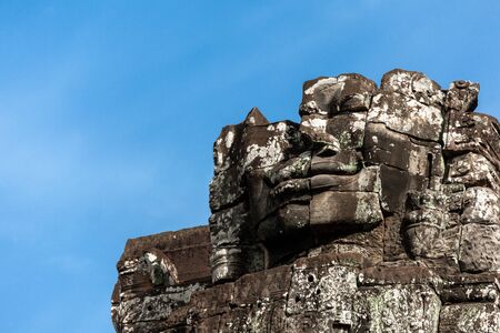 Part of remain the ancient stone face of Bayonの写真素材